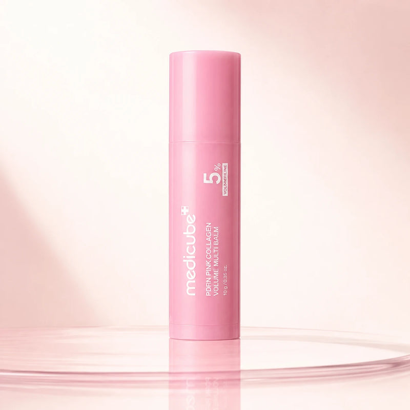 medicube PDRN Pink Collagen Volume Multi Balm 10g closed pink stick on an ivory background