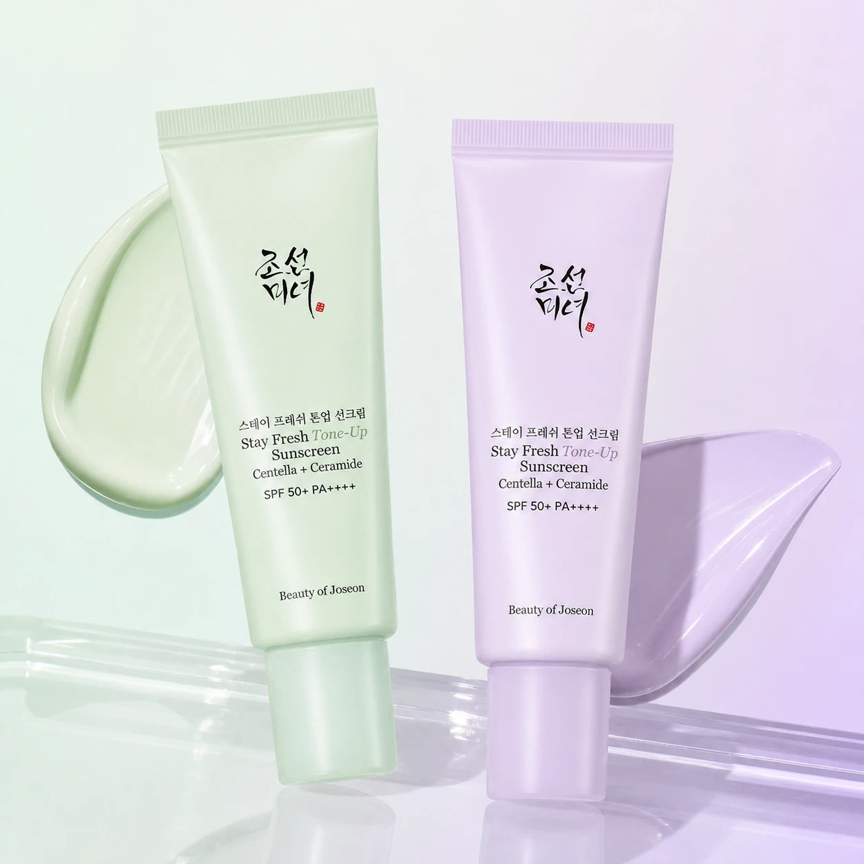 Beauty of Joseon Green and Purple Tone-Up Sunscreen with matching cream swatches
