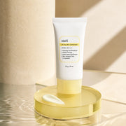 Dear, Klairs All-day Airy Sunscreen on yellow glass beside water and gel-cream texture
