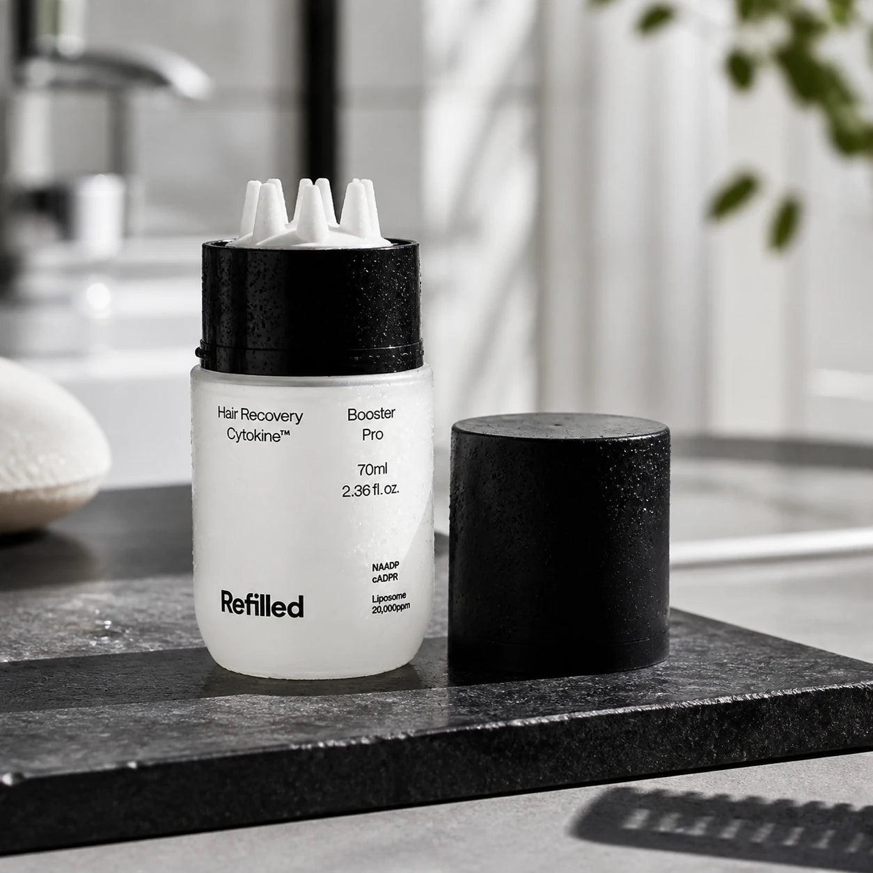Refilled Hair Recovery Cytokine Booster Pro 70ml in a modern bathroom hero scene