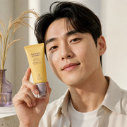 Man holding haruharu wonder Black Rice Moisture Airyfit Daily Sunscreen beside his face