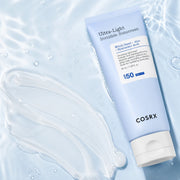 Serum-gel texture of COSRX Ultra-Light Invisible Sunscreen on pale blue glass