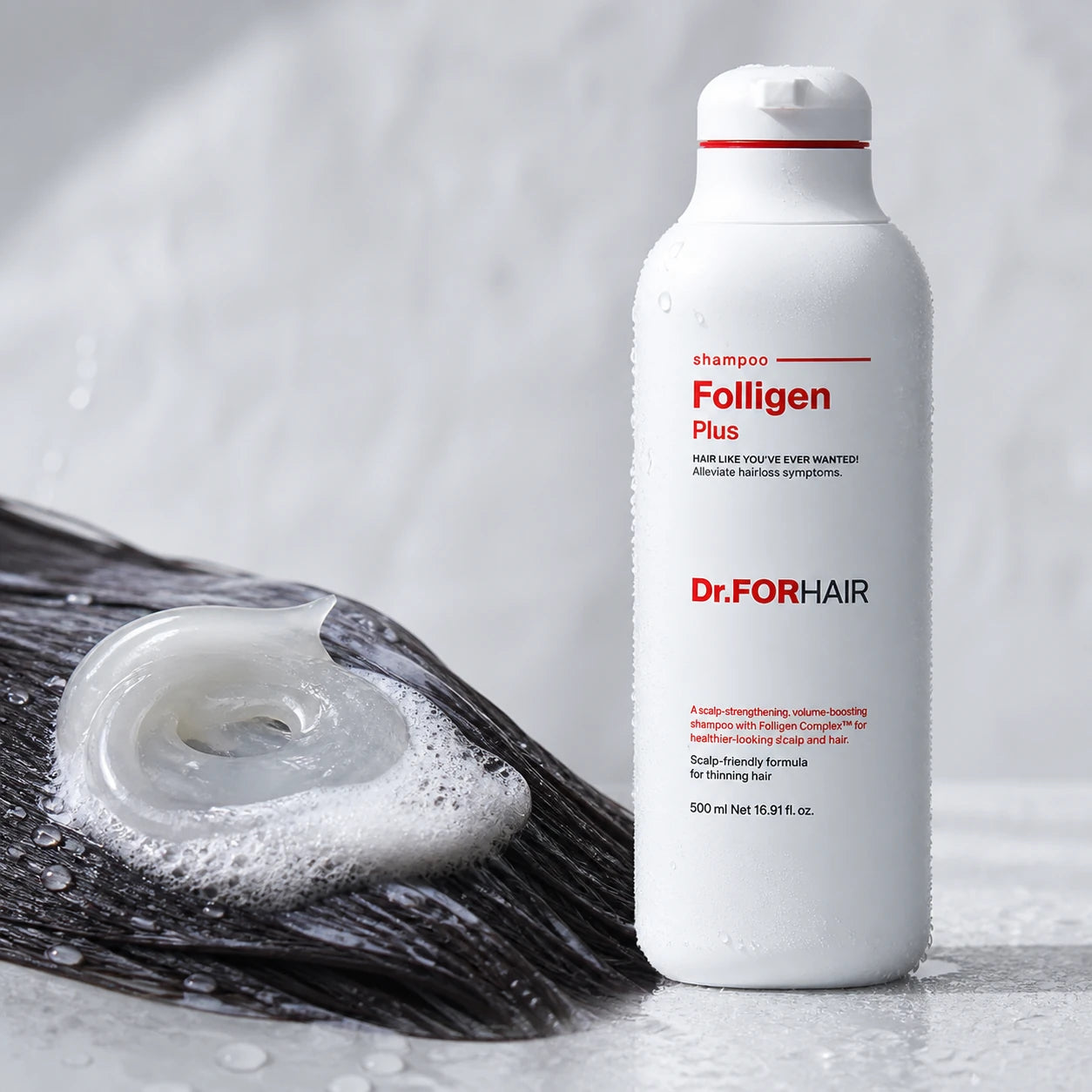 Translucent shampoo gel and creamy lather beside Dr.FORHAIR Folligen Plus Shampoo