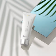 9wishes White Tone-Up Body Serum SPF21 150ml tube beside a mirror in sunlight