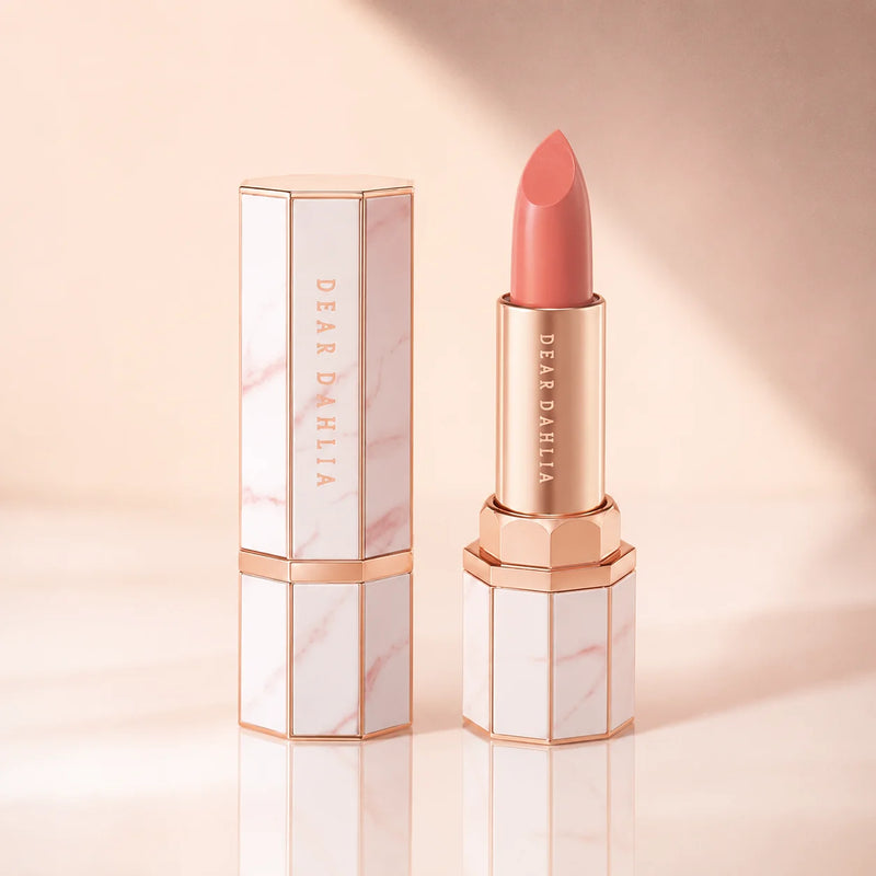 ProtoClinical k-beauty [DEAR DAHLIA] Blooming Edition Lip Paradise Sheer Dew Tinted Lipstick 3.4g hero graphic with slim nude-toned lipstick packaging, multiple shade visuals, and a soft neutral background