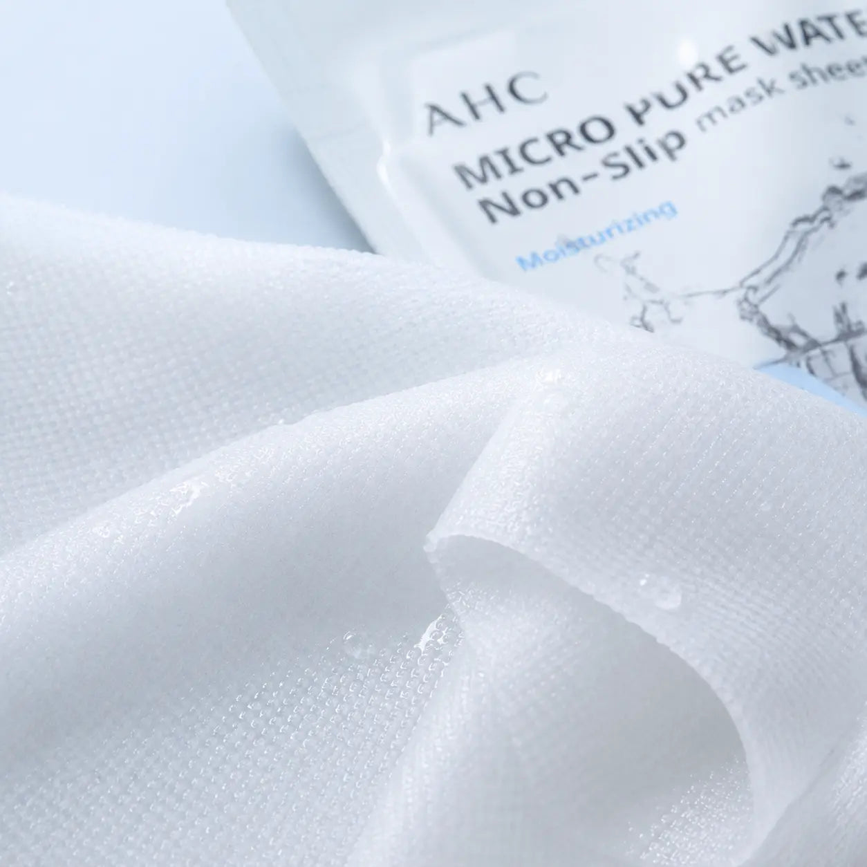 Fine micro-embossed AHC sheet mask saturated with clear essence