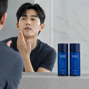 Man pressing AHC Only For Man lotion along the jawline after shaving