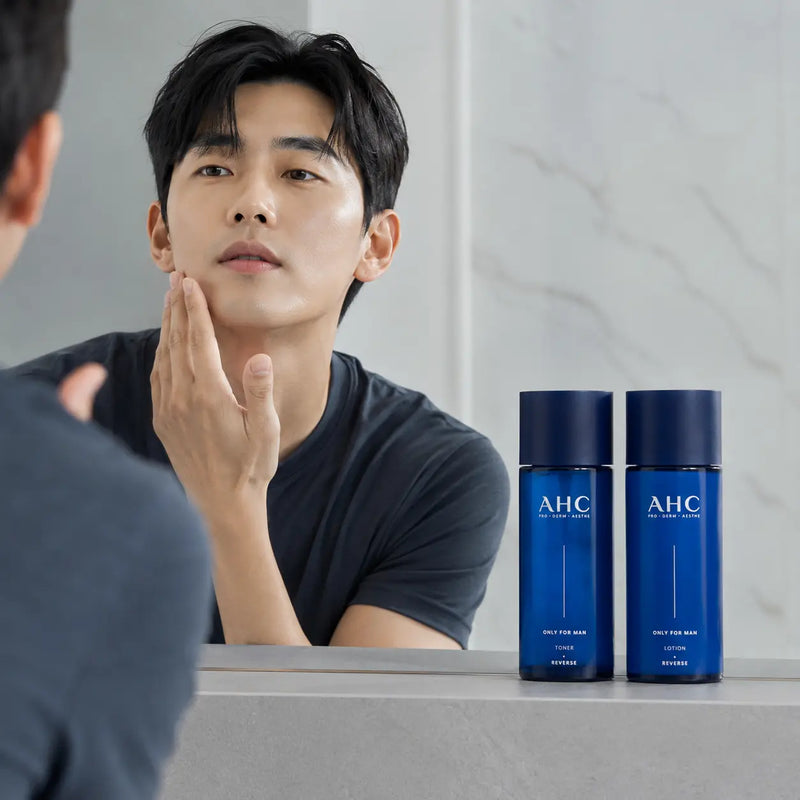 Man pressing AHC Only For Man lotion along the jawline after shaving