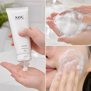 AHC cleansing foam dispensed, lathered, and massaged over damp skin