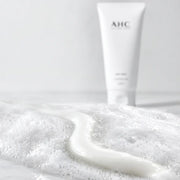 Pearly AHC cream cleanser transforming into dense white foam