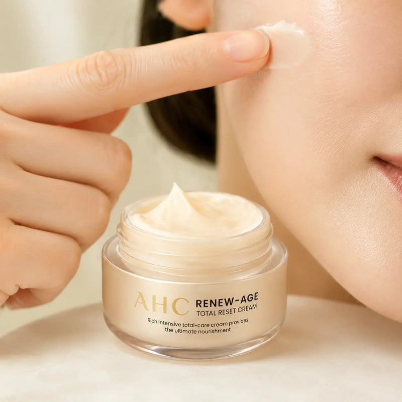 AHC Renew-Age cream applied to the cheek