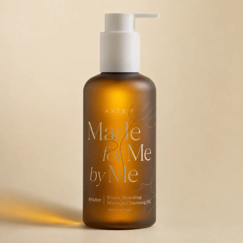AXIS-Y Biome Resetting Moringa Cleansing Oil 200 ml amber pump bottle