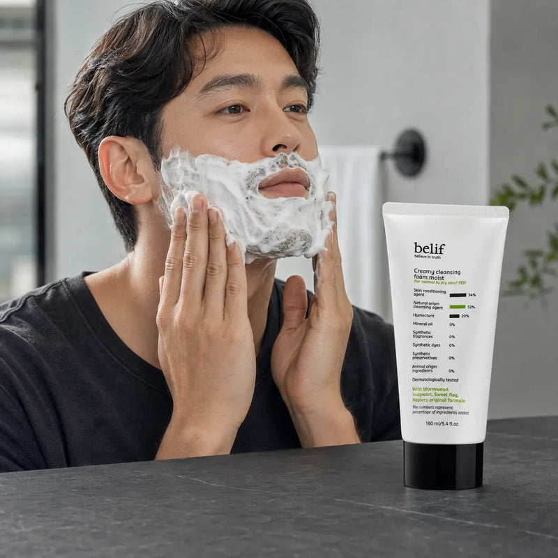 Man applying belif Manology Cleansing Foam as a shaving lather