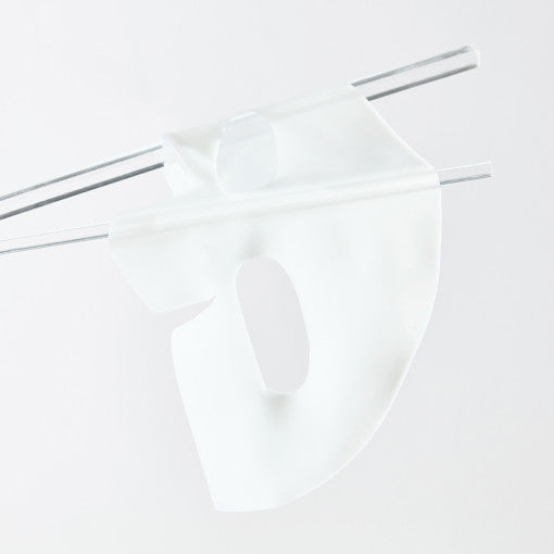 Close-up of white hydrogel face mask draped over clear rods, showing thick and flexible texture, available at ProtoClinical.