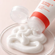 Macro view of the smooth cushiony white A-Cure Blemish Calming Cream texture