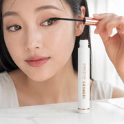Applying COSNORI washable lengthening mascara with slim curved brush