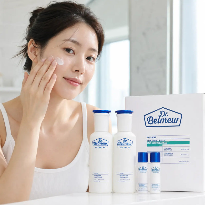 Woman applying Dr.Belmeur Advanced Cica Emulsion to clean skin