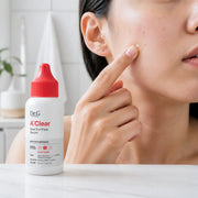 Applying Dr.G A'Clear Spot For Face Serum to one post-blemish area