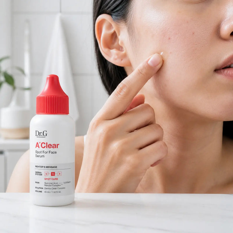Applying Dr.G A'Clear Spot For Face Serum to one post-blemish area