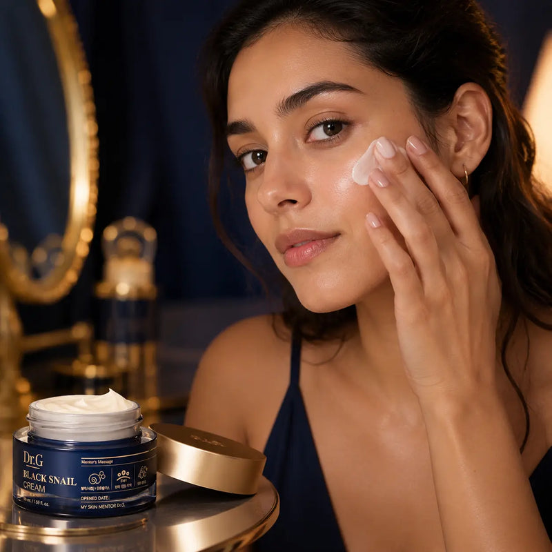 Applying Dr.G Black Snail Cream as a rich evening moisturizer