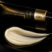 Macro view of the silky ivory eye cream texture