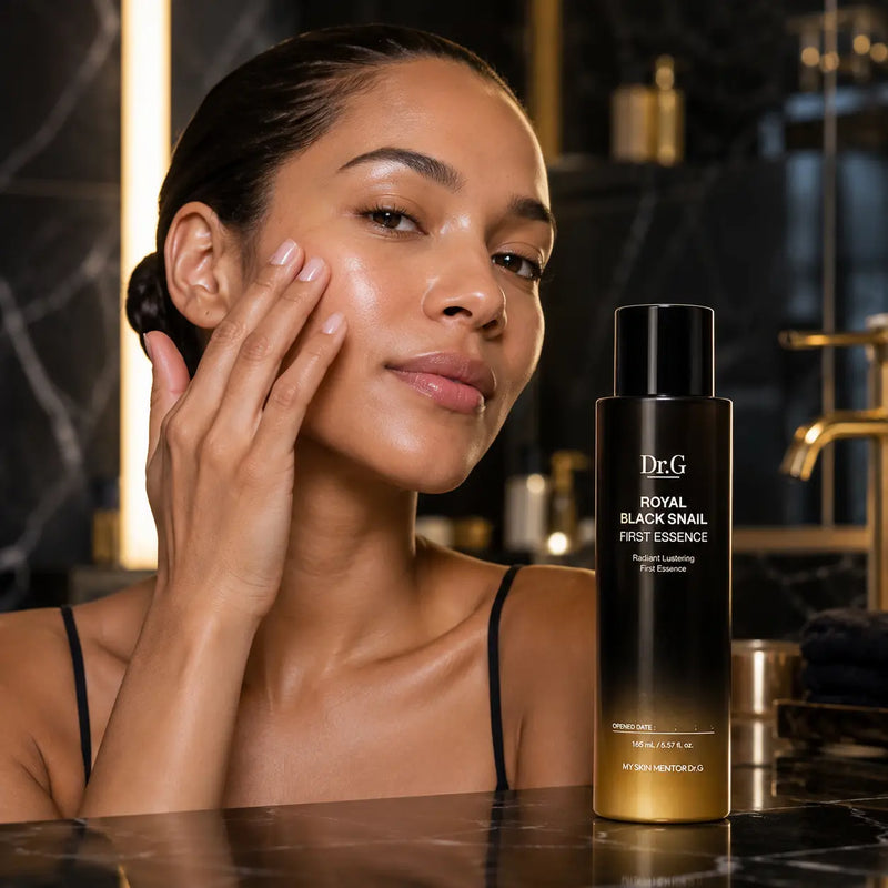 Applying Dr.G Royal Black Snail First Essence as the first skincare step