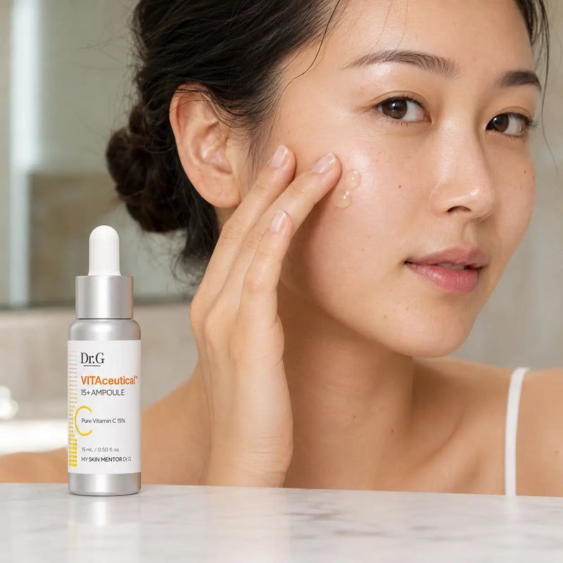 Applying Dr.G VITAceutical 15+ Vitamin C Ampoule to the cheek
