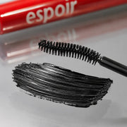 Clean Black mascara formula and curved bristle brush