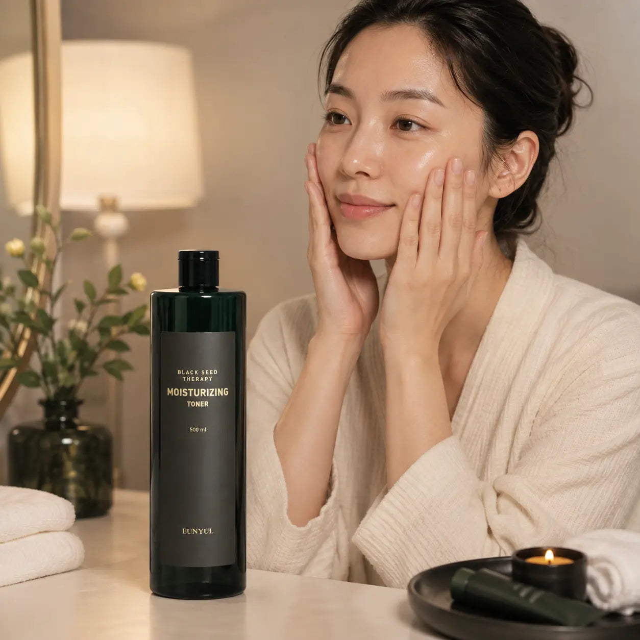 Pressing EUNYUL Black Seed Moisturizing Toner into dry-feeling skin