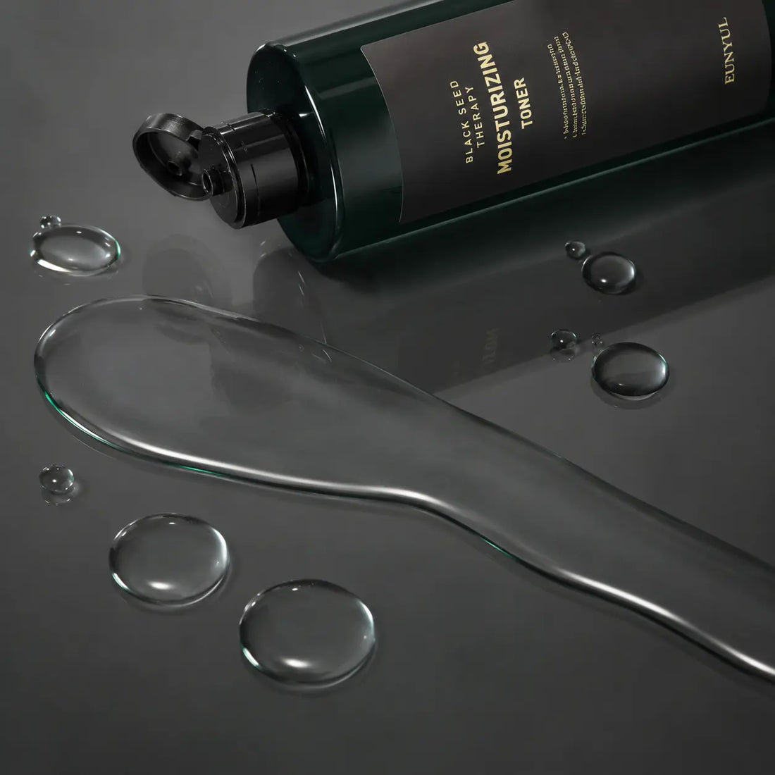 Transparent lightly cushioned watery toner with a soft dewy finish