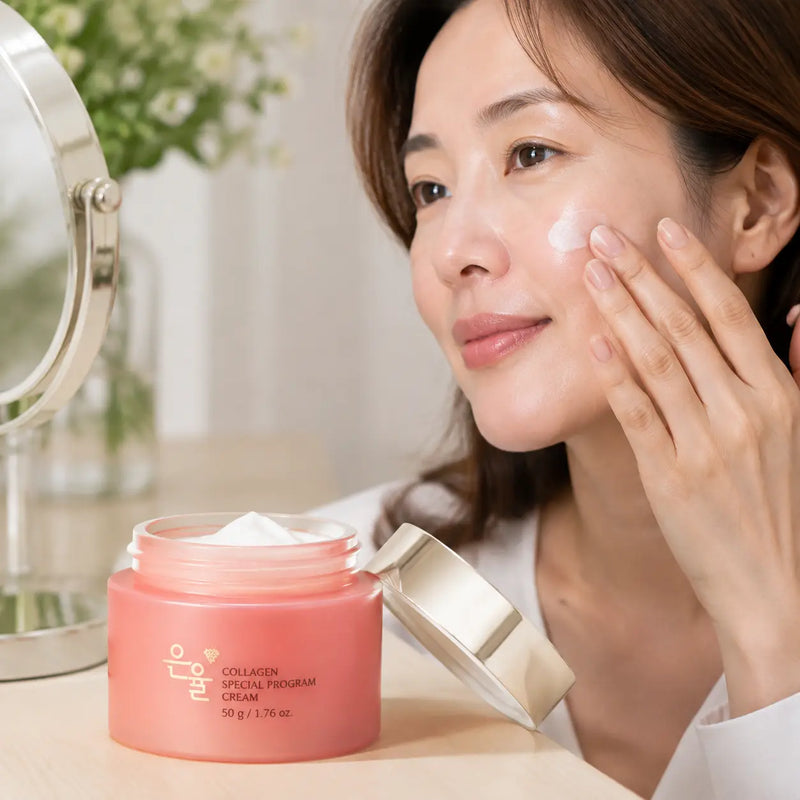 Woman applying EUNYUL Collagen Special Program Cream to her cheek