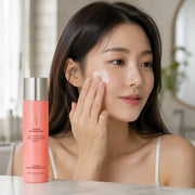 Woman applying EUNYUL Collagen Special Program Lotion to her cheek