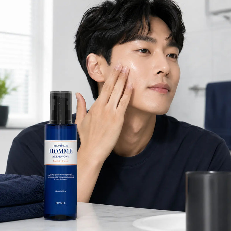 Applying EUNYUL Homme All-in-One fluid after cleansing