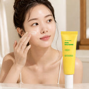 Model applying EUNYUL Vita Balance Own Sole Shine Facial Cream