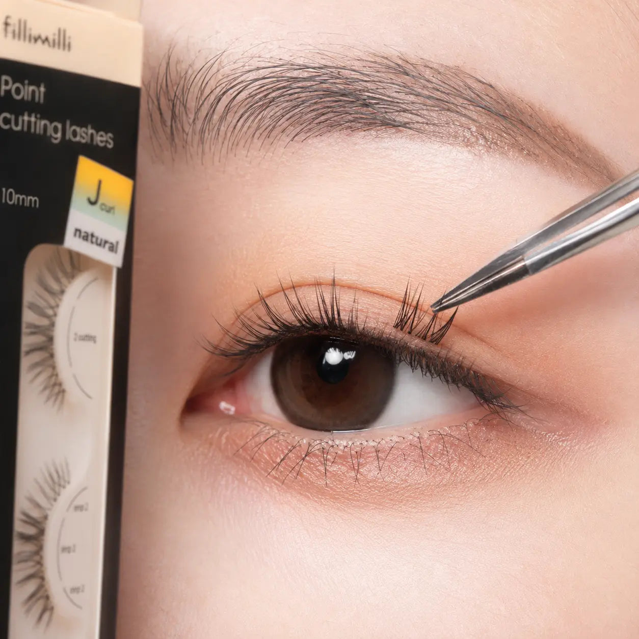 Applying a pre-cut Fillimilli Natural J Curl lash section
