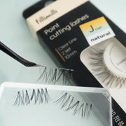 Close-up of Fillimilli Natural J Curl lash sections and clear band