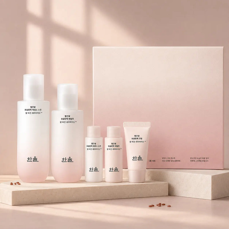 Complete HANYUL Red Rice Moisture Firming five-piece set on blush stone plinths