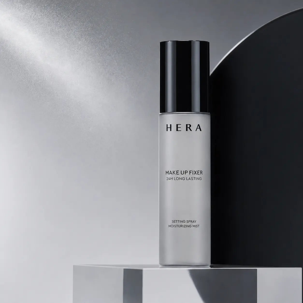 HERA Make Up Fixer on ice-gray acrylic with ultrafine mist