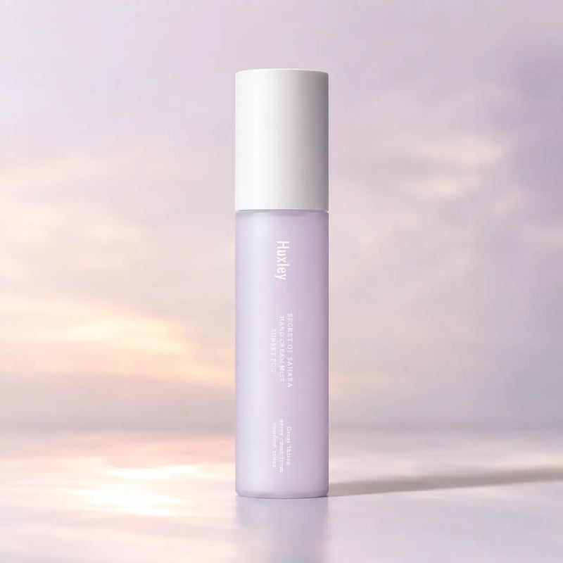 Huxley Sunset Fog hand cream mist in its slim 35 ml lilac bottle