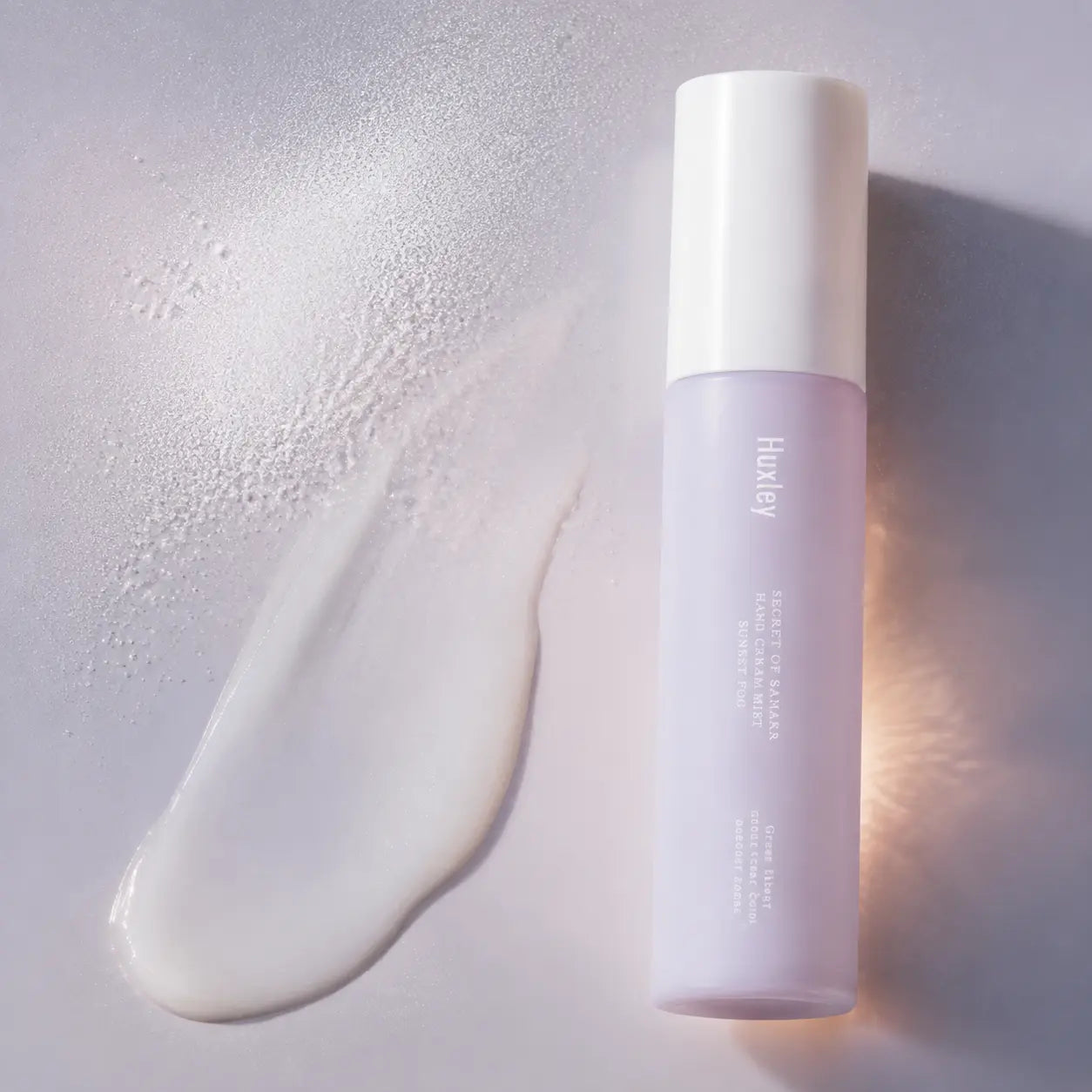 Fine milky microemulsion texture of Huxley Sunset Fog hand cream mist