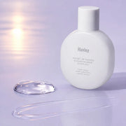 Clear gel essence texture of Huxley Sunset Fog hand refresher
