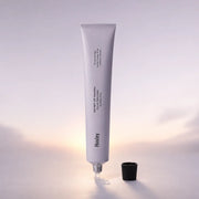Huxley Sunset Fog solid perfume in its pale lavender 20 g tube
