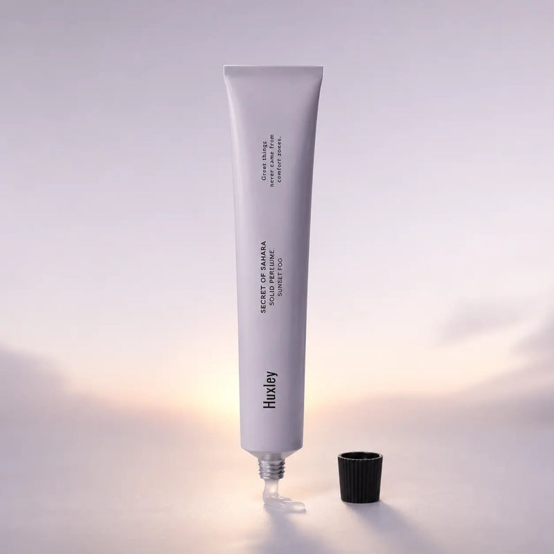 Huxley Sunset Fog solid perfume in its pale lavender 20 g tube