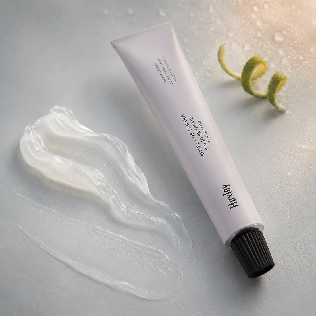 Pearly translucent gel-balm; smooth targeted finish with subtle sheen