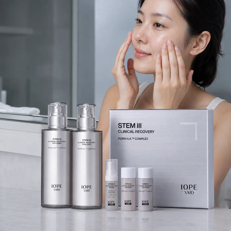 Woman pressing in IOPE XMD Stem III hydrating skincare