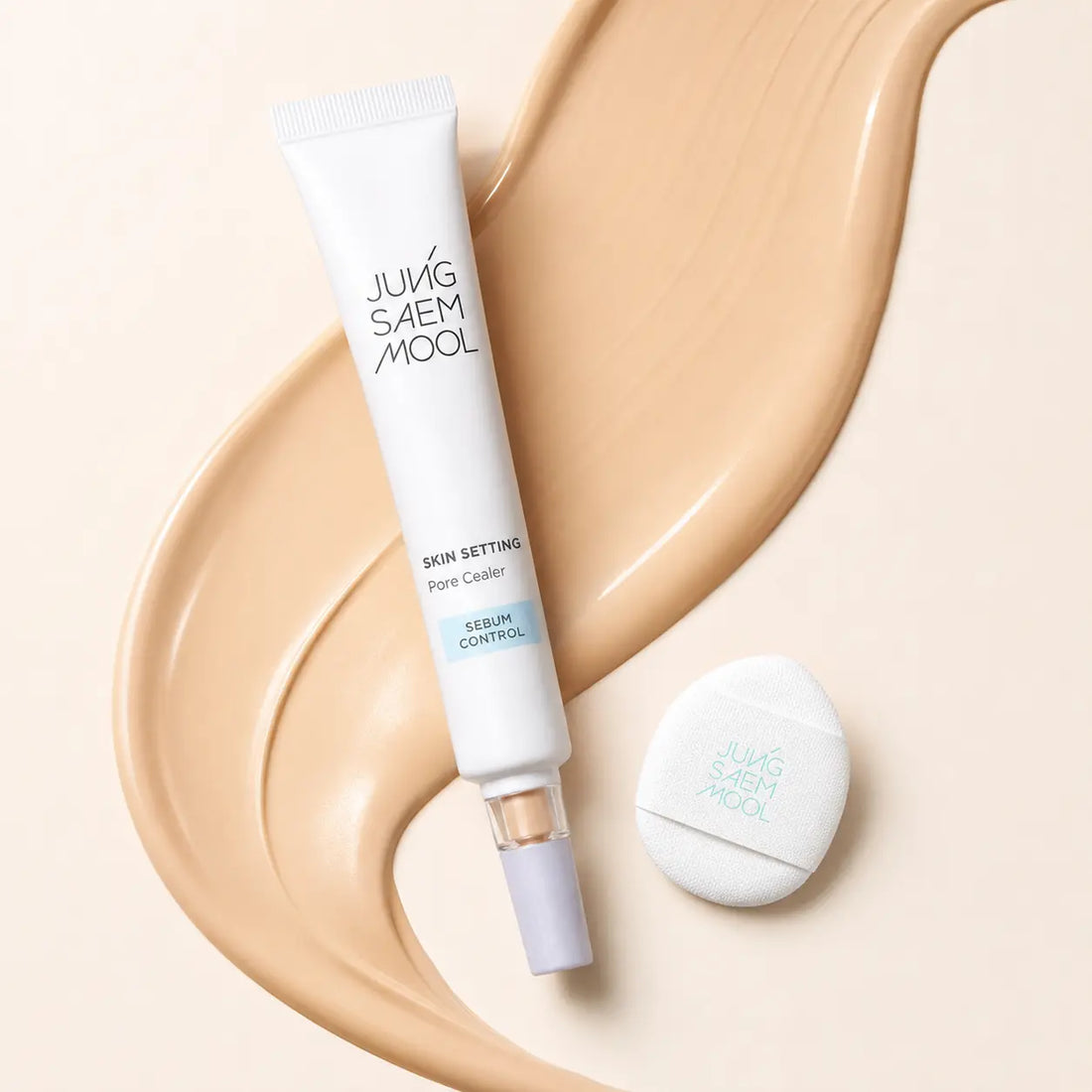 Silky beige silicone cream with a sheer powder-soft finish