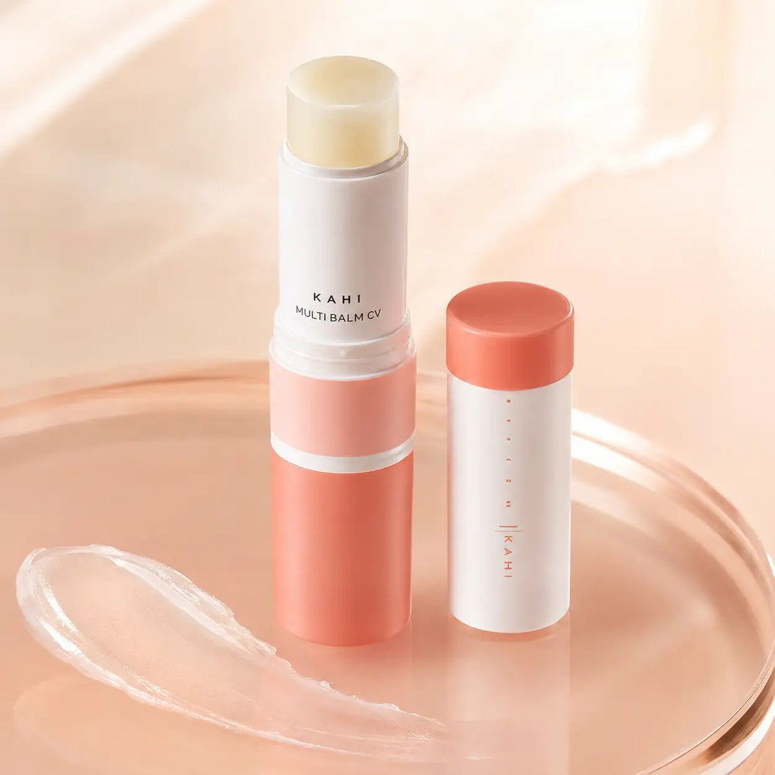 Translucent ivory solid balm with a glossy dewy finish
