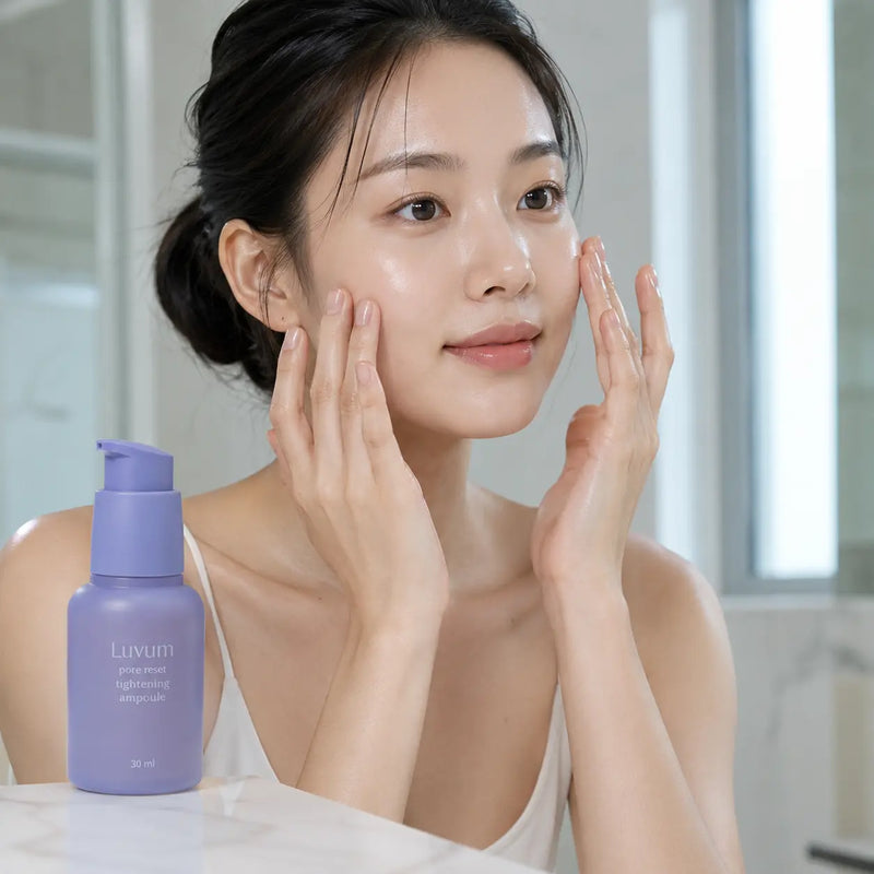 Woman applying Luvum Pore Reset Tightening Ampoule to her face