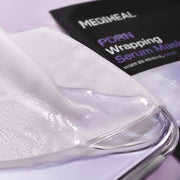 Macro texture of MEDIHEAL PDRN serum-saturated microfiber mask sheet