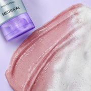 Pink cream texture with fine rose particles transforming into cleansing foam